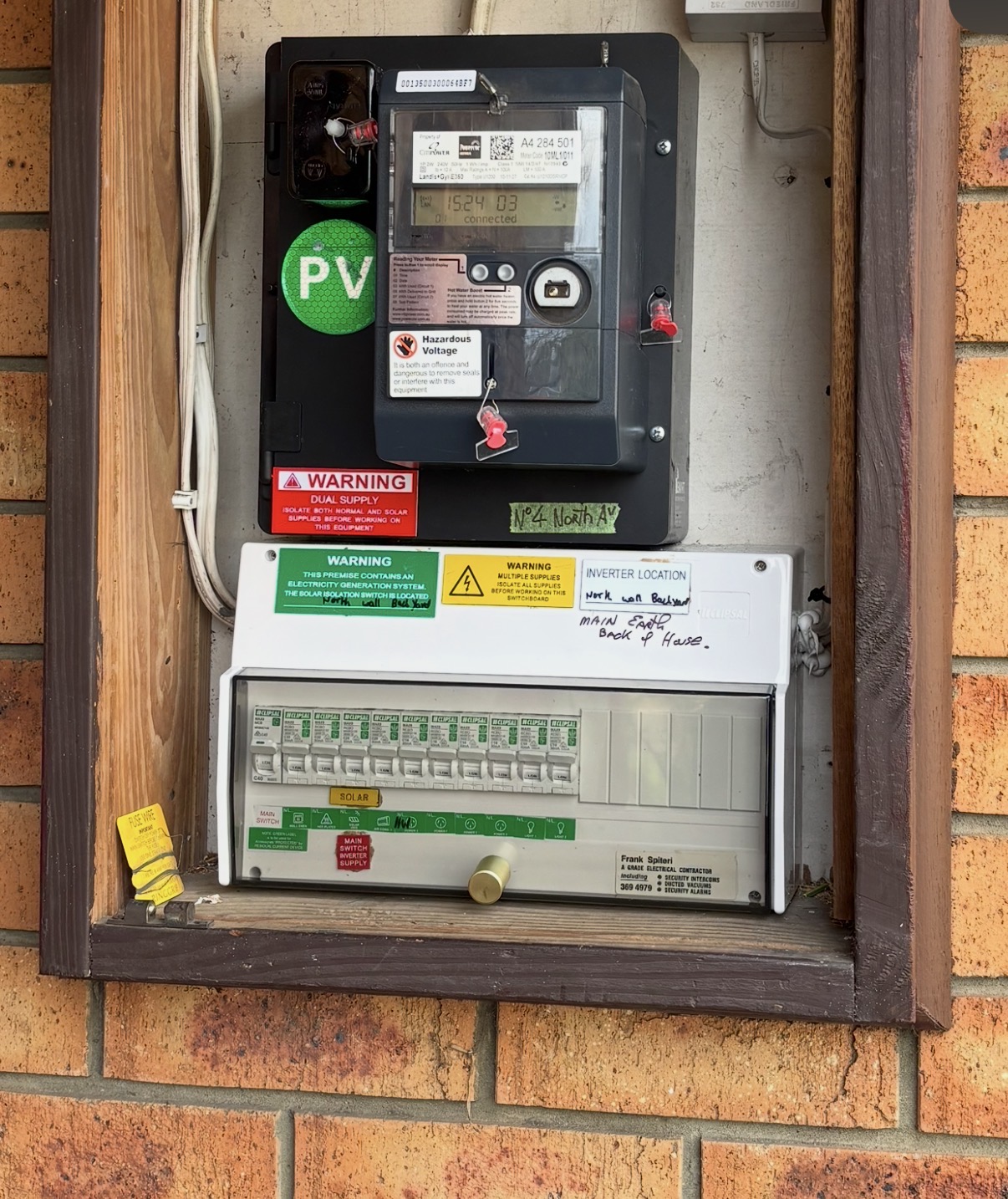 Switchboard labelled Frank Spiteri, A Grade Electrical Contractor